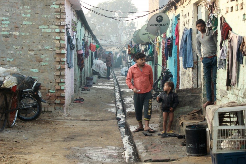 Rows of tiny one-room houses in Kapasheda where garment factory workers live. The landlords of these areas are infamous for hiking house-rents on whim.