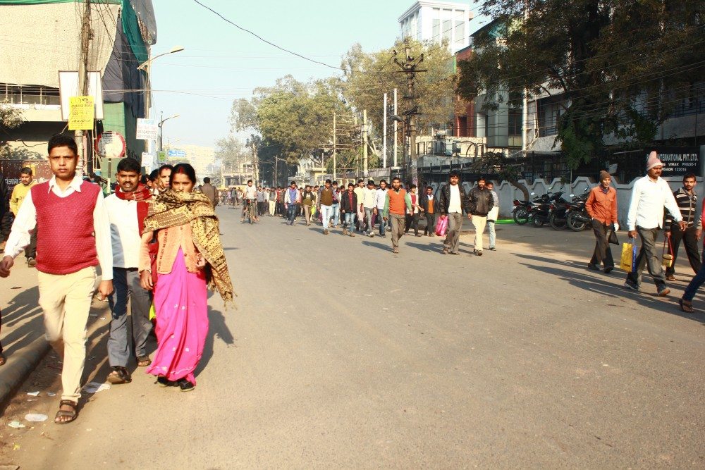Hundreds of workers make their way to the garment factories every morning. Many of them are not aware of the increase in the minimum wage made by the Haryana government.